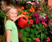 Little girl pouring flowers
